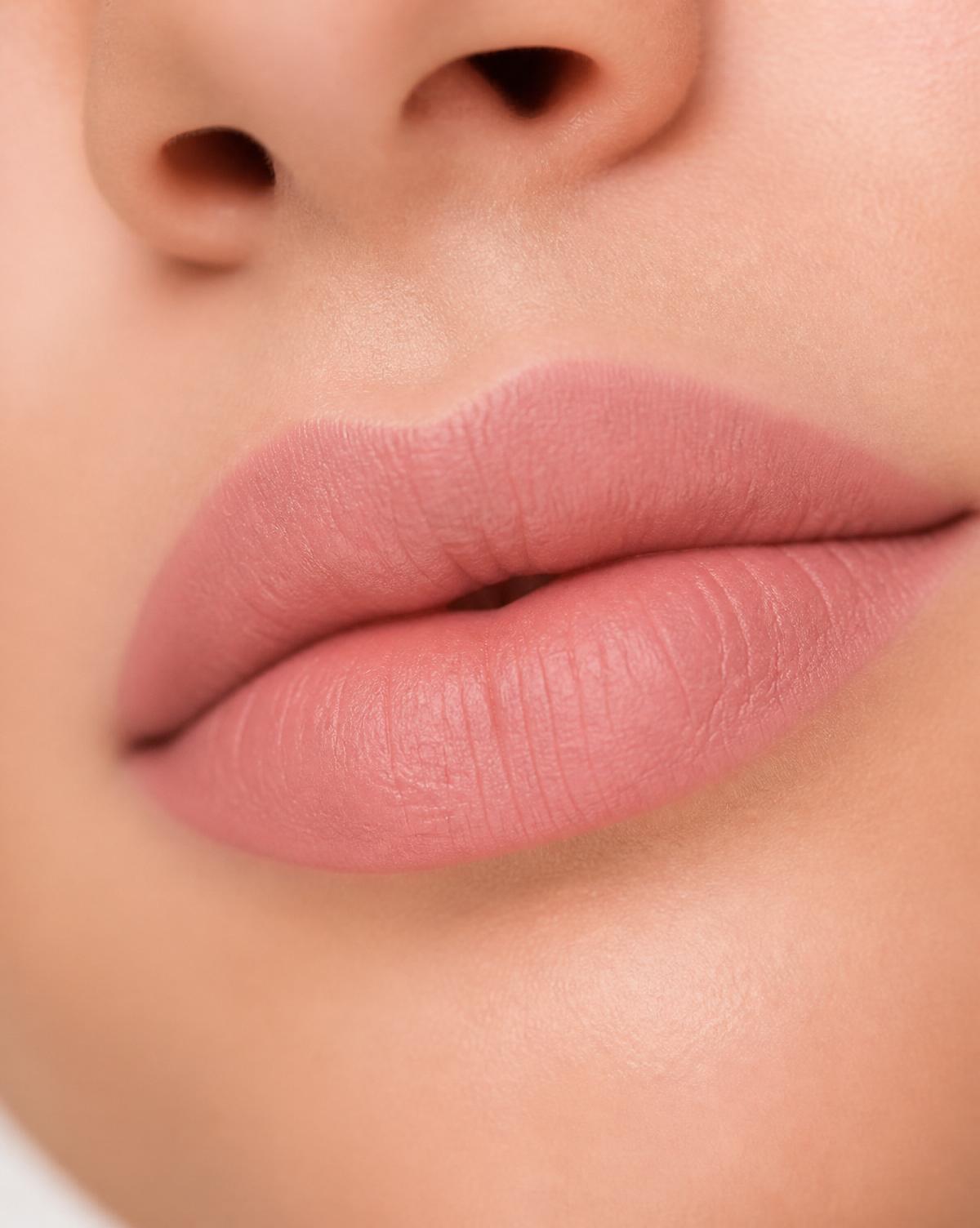 Editorial macro of a softly lined lip